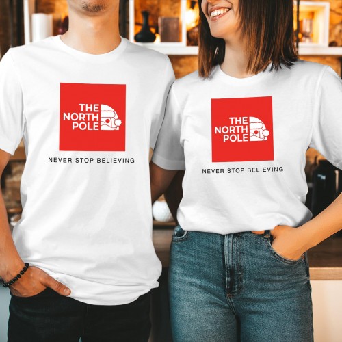 Funny The North Pole Christmas T Shirt, Parody Santa Claus Lapland Family Holiday Tee, Never Stop Believing Matching Couples Winter Gift Top